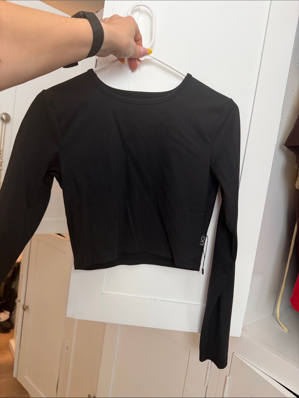 Black Long-Sleeve Crop Top with Subtle Side Logo